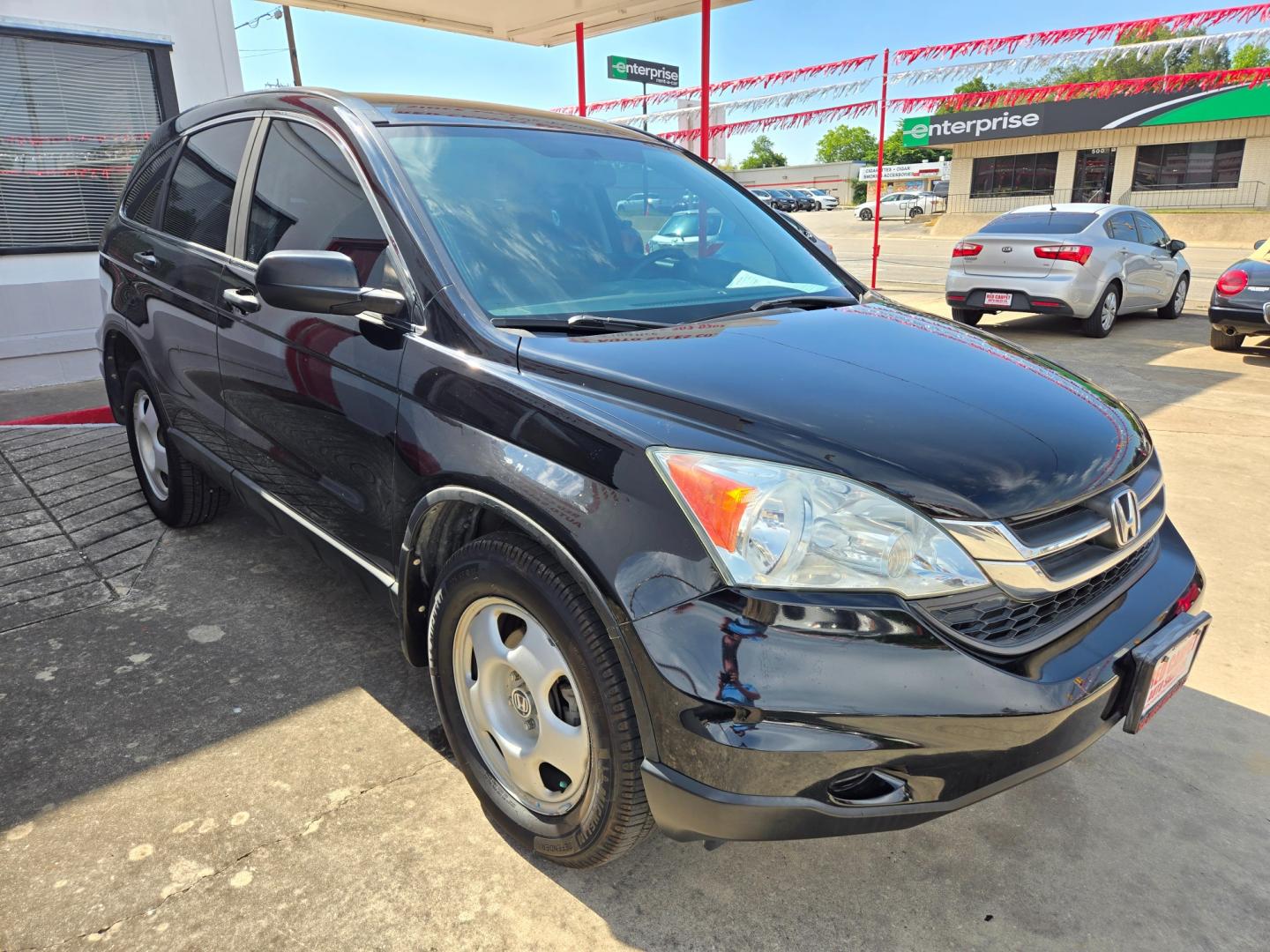 2010 Black Honda CR-V LX 2WD 5-Speed AT (5J6RE3H38AL) with an 2.4L L4 DOHC 16V engine, 5-Speed Automatic transmission, located at 503 West Court, Seguin, TX, 78155, (830) 379-3373, 29.568621, -97.969803 - Photo#1